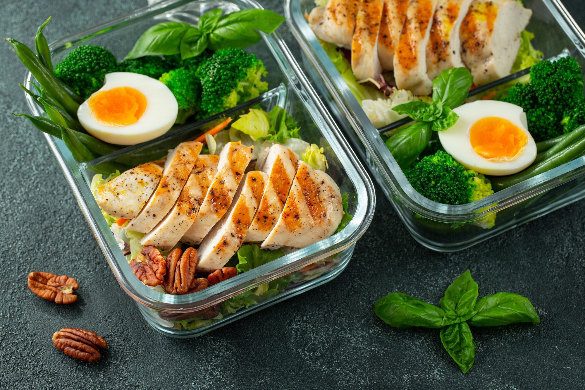 Healthy meal prep containers with chicken breast